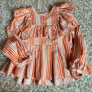 Beautiful top by Moque.